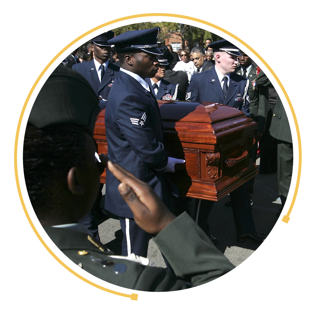 Rosa Parks' funeral proceddings including her coffin being carried.
