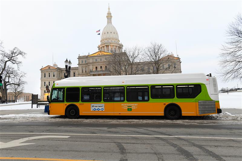 CATA's Rosa Parks Tribute Bus in front of the capitol building